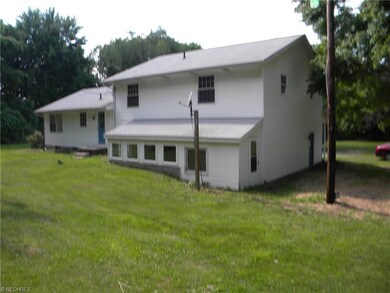 Rear view of the house.  This shows the enclosed p