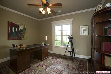 High Ceilings in Office with crown moldings and ha