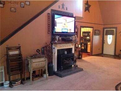 Living Room. Propane Fireplace warms the home and 