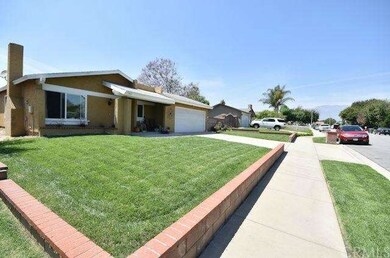 Large manicured front yard.