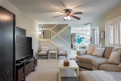living room with view of eating area