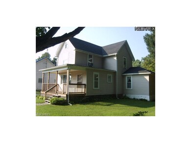 Side view: note newer siding, roof and front porch