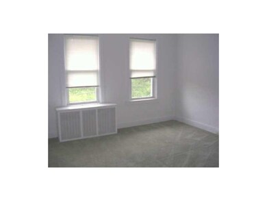 Bedroom. PARTIAL VIEW OF BEDROOM THREE WINDOWS WID