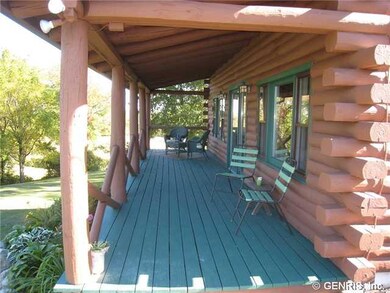 Deck. Covered rear deck overlooking the back yard.