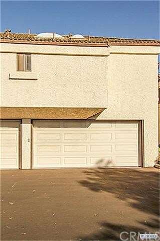 Two car garage directly across from your home