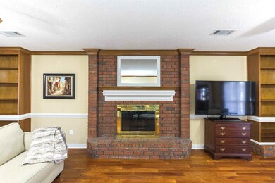 Masonry fireplace that's wood burning with ash cle