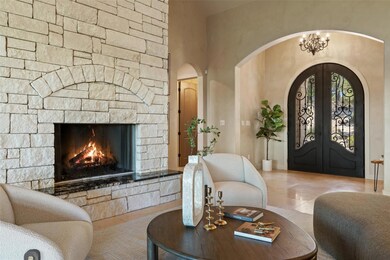 Living area featuring french doors, a high ceilin