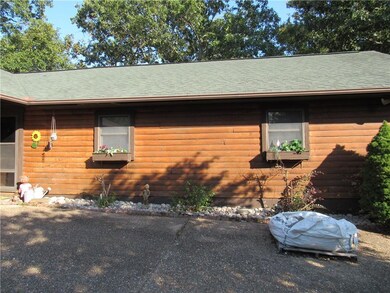Front Flower Boxes and Solid Wood Log