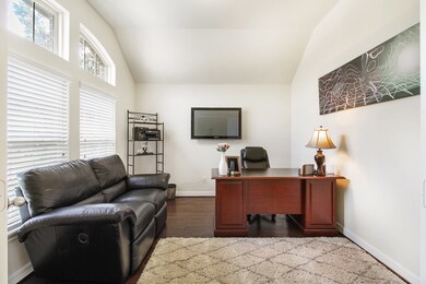 Luxurious office with hardwoods and tons of natural light