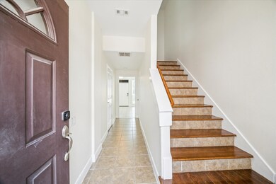 Generously sized living area ideal for both relaxing and entertaining, with excellent natural light throughout.