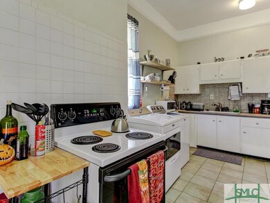 Downstairs kitchen with washer/dryer hookups