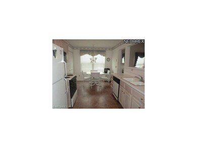Double windows in this spacious kitchen. There is 