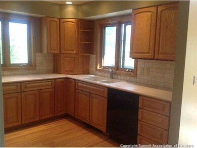 Kitchen. Spacious kitchen with corian countertops