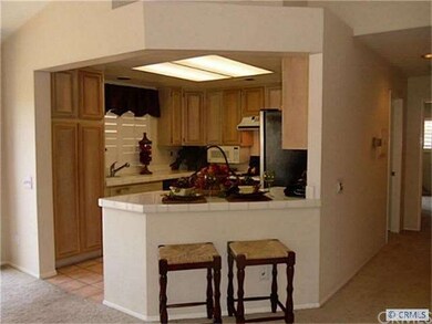 Open kitchen with bar area for quick meals