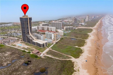 View of urban area with waterfront with a beach