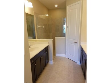 Master bathroom has split sinks and a fabulous walk in shower