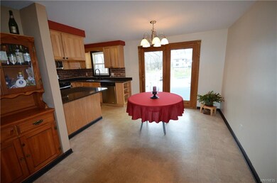 Terrific eat-in kitchen with hickory soft close ca