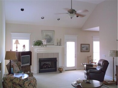 Walk into a large den the vaulted ceilings.