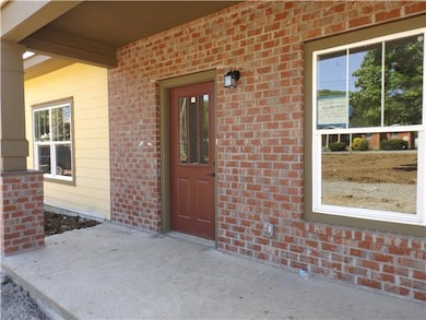 Check out the wonderful front porch and brick exterior accents!  Classic 