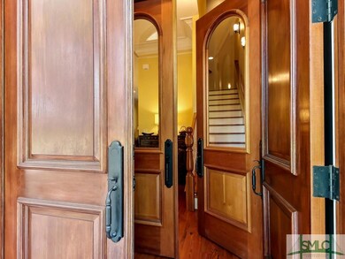 Traditional Victorian double door entry with solid