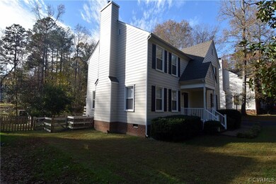Side View.  There is a gorgeous Magnolia tree in t