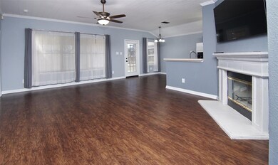 Unfurnished living room with dark hardwood / wood-