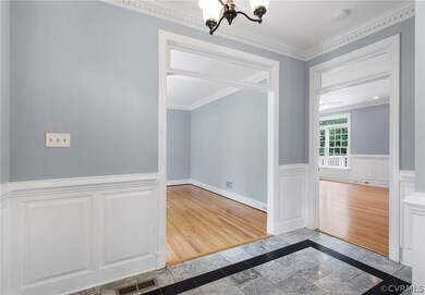 Formal living room  or office space to the left, f