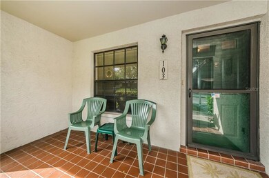 Small tiled front porch.