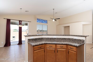 Kitchen Island view to backyard