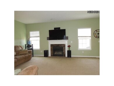 Open and Spacious Family Room Accented by a Firepl