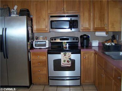 Kitchen - stainless steal appliances, tile floors