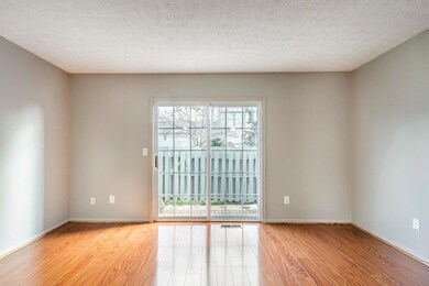 Entry from Living Room to fenced Patio