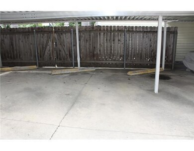 Parking Lot/Garage. One covered parking spot