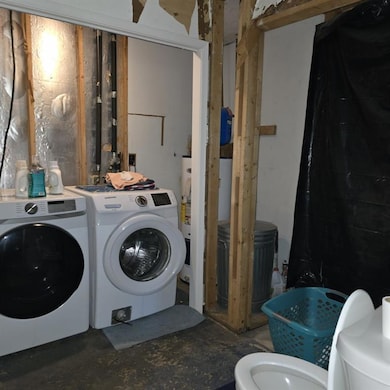 Laundry closet in the hall bathroom.
