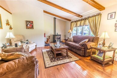 16x14 LIVING ROOM w/ Cathedral Ceiling and Pellet 
