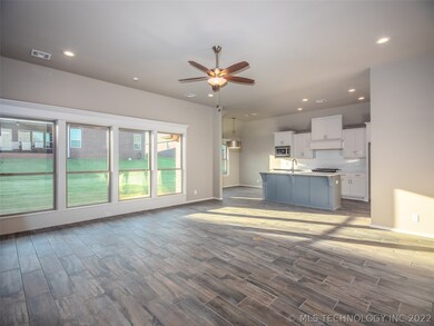 Wide Open Floor Plan with wall of windows overlook