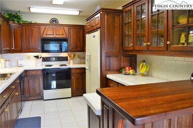 Main level has kitchen, den, full bath and great r