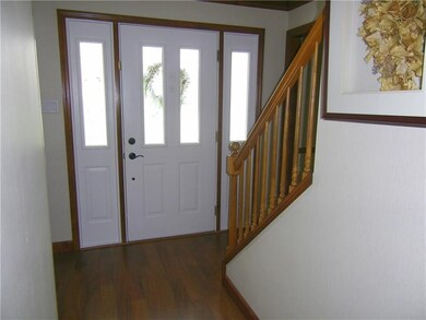 Foyer leads to Living Room and Dining Room to eith