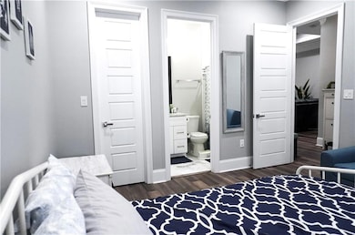 Bedroom suite off of foyer