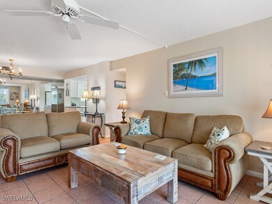 Living area featuring light tile patterned floors,