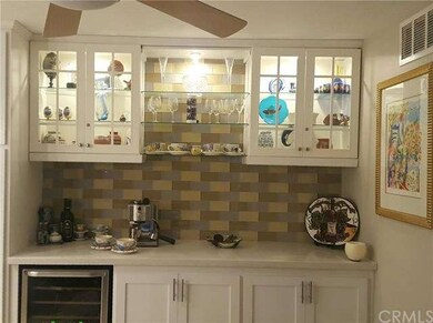 wine and cofee bar with plenty of storage cabinets