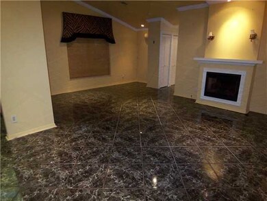 Living Room. Dressed in a neutral decor,vaulted ce