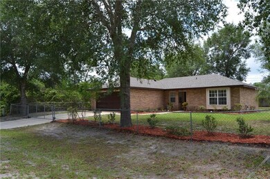 Gated driveway and lovely landscaping.  Brand new roof and exterior paint!