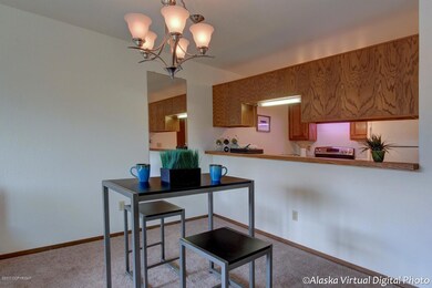 Dining area w/updated chandelier