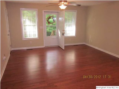 View of living room from kitchen, looking toward f