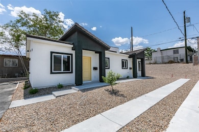 View of front of property featuring stucco siding