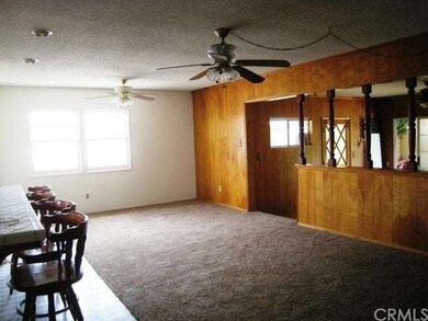Kitchen looks into the living room