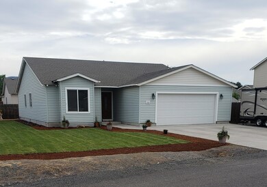 front and side with grass