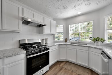 The kitchen cabinets were replaced and granite counters installed. The appliances were upgraded with stainless steel and there is a gas range.