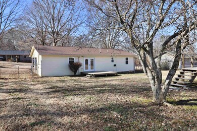 Back of property with french doors